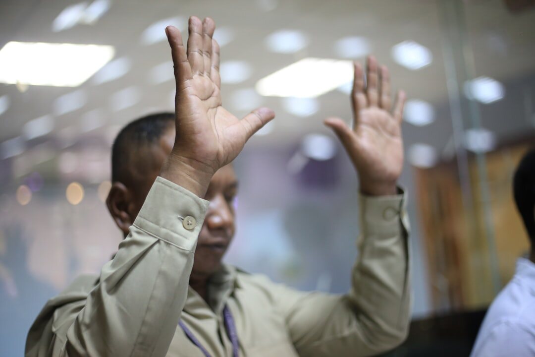 person using hand gestures in conversation