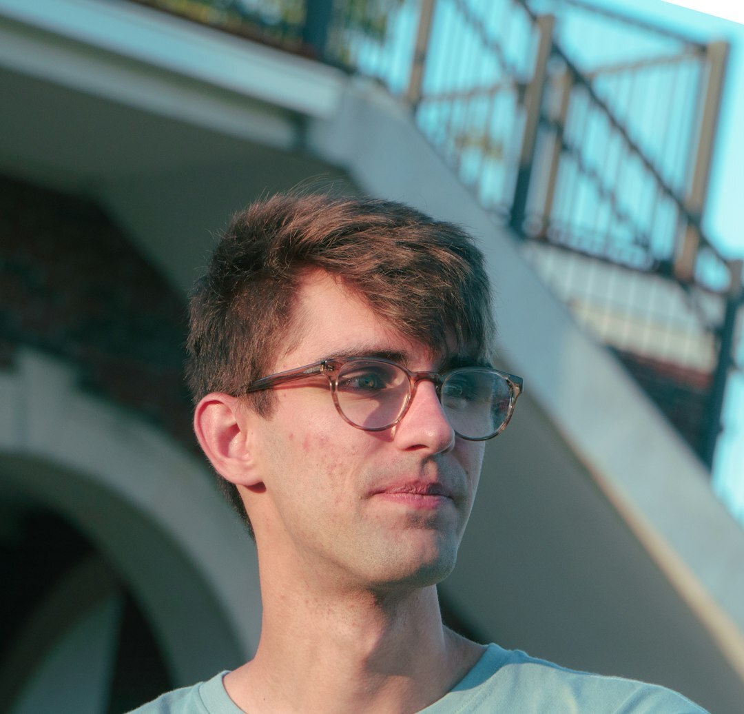 Portrait of a Brazilian man coach with glasses