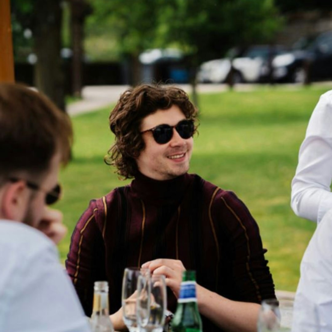 Group of Brazilian friends laughing outdoors