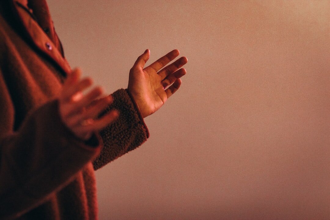 person using hand gestures in conversation